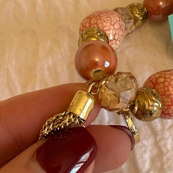 Beaded Stretch Bracelet w/ Gold Charms – Pink & Gold (Imperfection on tassel) - Picture 6 of 8